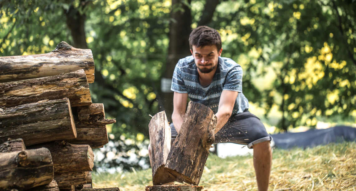 Man chopping wood with an axe